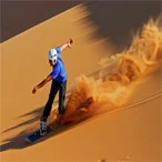 Sandboarding at Maranjab desert - Iran desert tour package